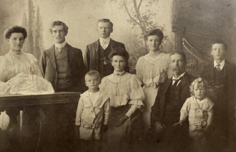 Len's family as a child. He is the youngest child on the right.
